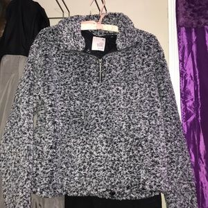 black and white sherpa with pockets